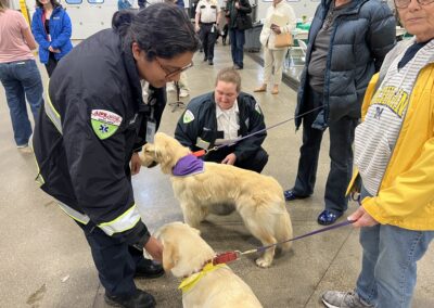 Puppies in training check out ambulances, EMTs (May 2025)
